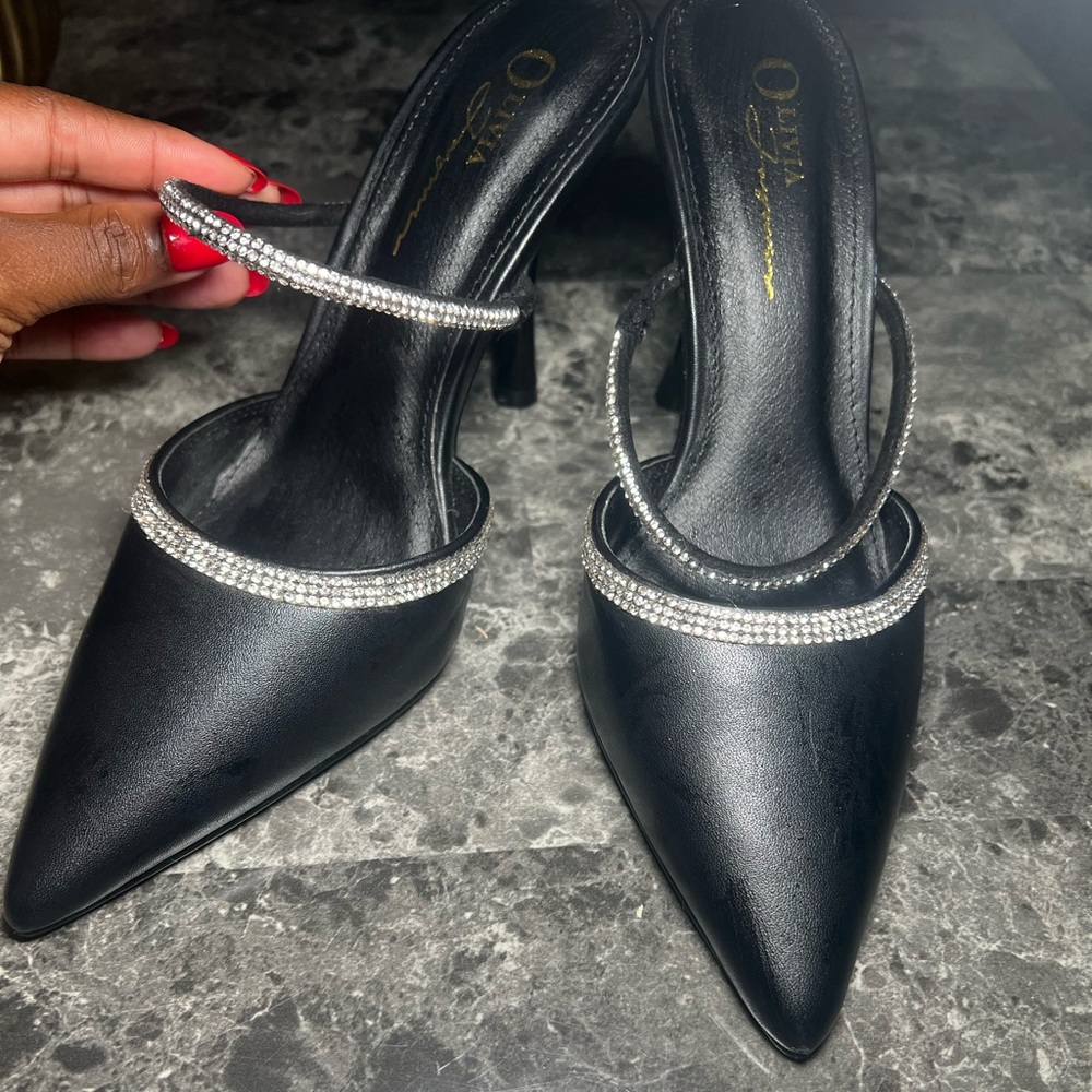 Black pointed heel with rhinestones at the top
